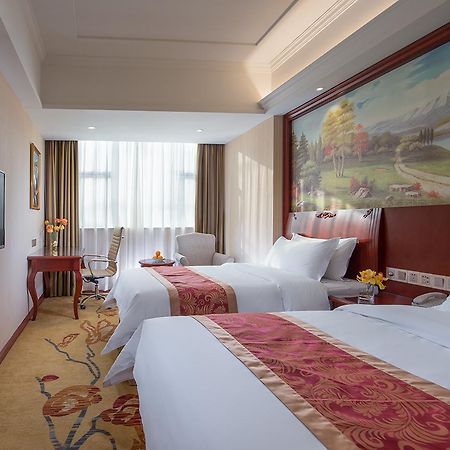 Vienna Hotel Zhongshan Guzhen Town Center Екстериор снимка
