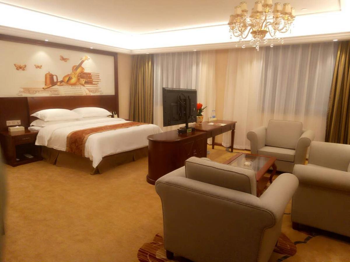 Vienna Hotel Zhongshan Guzhen Town Center Екстериор снимка